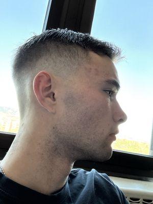Mid skin fade with drop in back