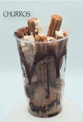 Churros
sweet dough pastries served with ice cream, topped with whipped cream amd chocolate.