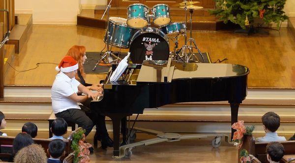 Dr. Regina and piano student Mahammad performing a duet of Bella Ciao, an Italian Folk Song!