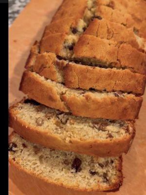 This is how our banana nut bread looks inside full of nuts from top to bottom it's a must to have. It's very moist.