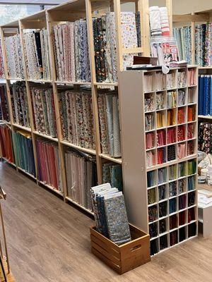 We have over 2500 bolts of fabric for your quilting and sewing projects.