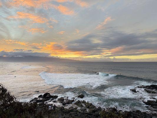 Spectacular view of surfer and sunset