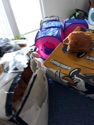 Waterlogged box. Chicken spilled out when I picked it up.