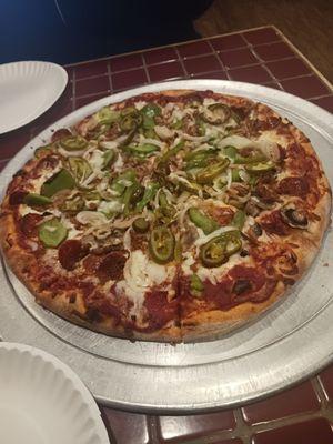 Bishops special. Very awesome pizza loaded with veggies and meat