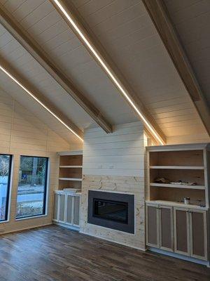 Custom strip lighting in traditional beach bungalow.
