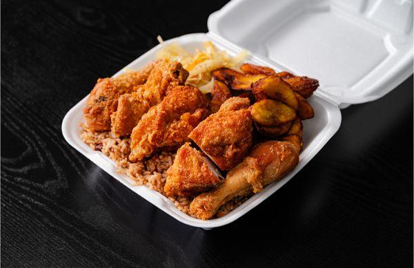 Fried chicken with rice & beans cabbage & fried plantains