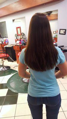 JANELLE cut my hair with the EXACT rounded bottom that I requested. It's symmetrical, feathered, voluminous and polished. I'M SUPER HAPPY!