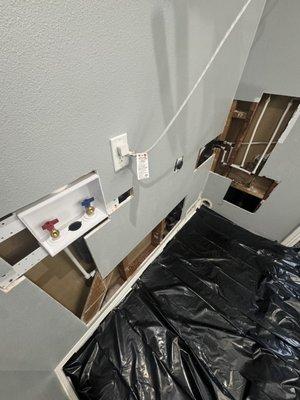 Laundry water box and drain relocation