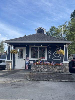 Out front (waiting in the line). They are drive thru only