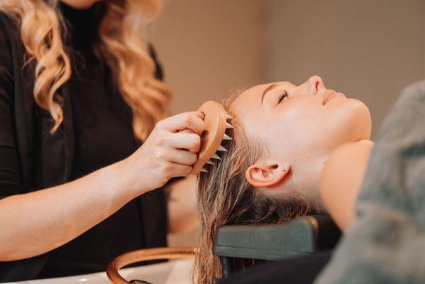 get a relaxing head treatment