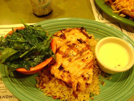 Grilled Salmon Fillet with rice and sauted spinach