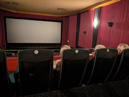 Upstairs seating with a more eye level view of the screen - 12/2025