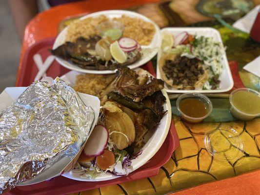 Carne asada plate and Pollo plate and a tacos