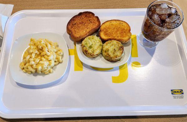 Side of mac and cheese, veggie medallions, and garlic bread to take home. Diet cola