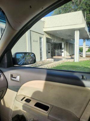 Front door. Worst place for parking. Watch out for curbs in the middle of the parking lot