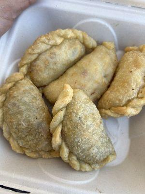 Chicken empanadas at top. Beef at the bottom. Both come with sauce.