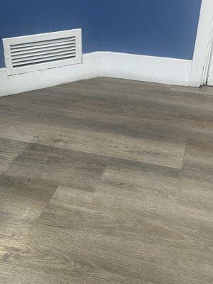 Dirty floor and dusty vent in exam room