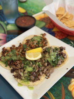 Asada and Al Pastor tacos