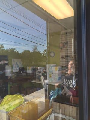 If you look hard you can see a clock up high on the wall. It says 6 but my cell phone said NETWORK time was 5:55