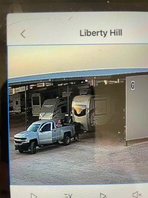 Thieves, one in red and one in black -hoodies in over 100° weather