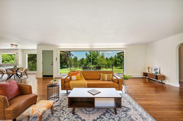 Living room with beautiful views of Orchard Hill Golf Course