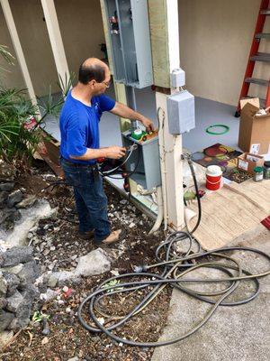 Rick installing a new meter at our house.  He put the whole thing up himself, and did a great job.