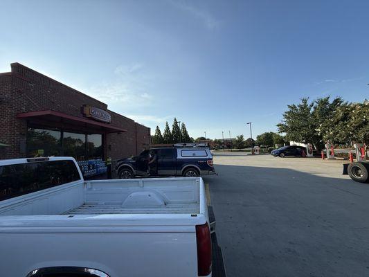 Tesla charging is in sheetz parking lot. McDonald's and more food options in walking distance.