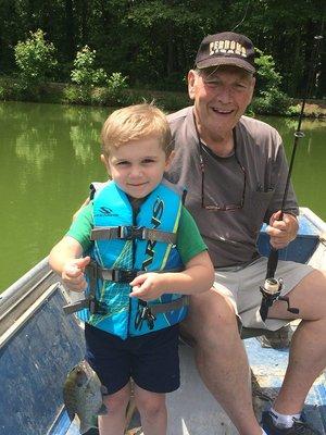 HIS FIRST FISH - A REAL WHOPPER !