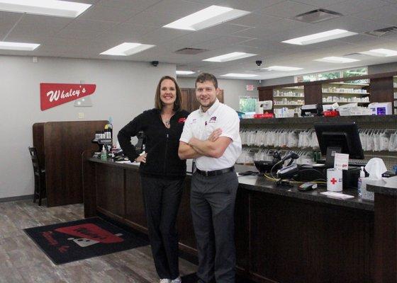 Whaley's President, Stacy, and Southwest Managing Pharmacist, Trevor, stand in newly remodeled Southwest Pharmacy