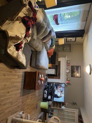 Beautiful couch, cats love it and so do we. Ignore my empty picture frames, i'm working on it haha.