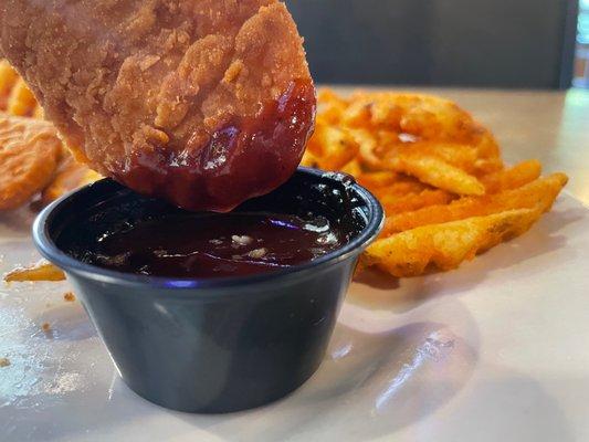 Seasoned Waffle Fries, Chicken Strips, and Barbecue Sauce