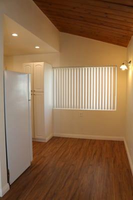 Stained wood ceilings, luxury laminate floors