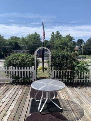 Beautiful open terrace for card/board playing fun! It's full sun tho so BYOUmbrella.