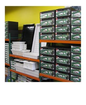 Sunlight Hoods and Tables stacked to the 23' ceilings.