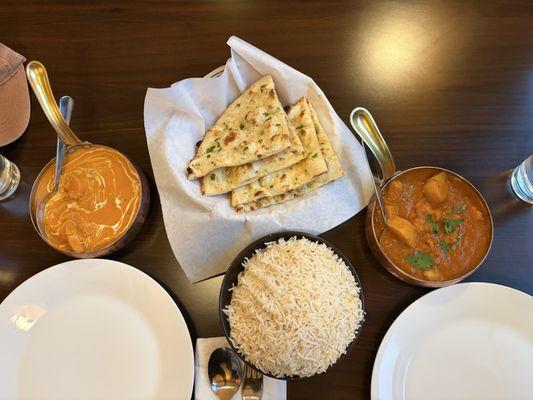 Butter chicken, Garlic Chili Naan, Chicken Vindaloo, 2 servings of rice (1 per curry)