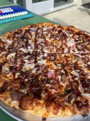 We love this spot! The brisket pizza was so freakin good. Had a caprese salad that was well put together as well. Worth a visit for sure.
