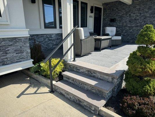 Front entrance area redesigned and installed with EZ Fit Veneer stone, Limestone Edging, with a Paver Inlay.