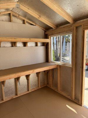 Inside with the shelf and peg board