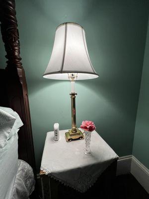 Night stand with fresh flowers and usb