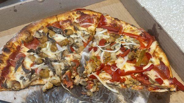 Lg pizza sausage, mushrooms, onions, bell peppers & anchovies. $29.11 + $4 del tip. Under done in the center.