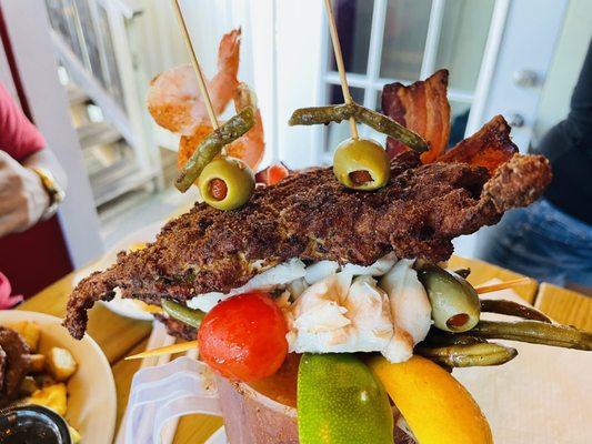 Quadruple Threat. Delicious Bloody Mary with soft shell crab, lump crab meat, shrimp and bacon.