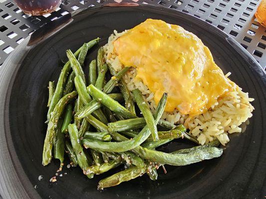 Garlic Butter Salmon wirh rice and fresh, roasted green beans. Yum!
