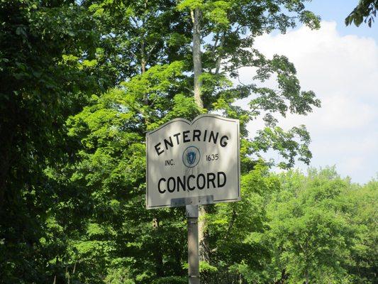 Entering Massachusetts sign. Look at the picture. That's Concord!