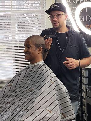 Barber mershaun lee cutting his father's hair!