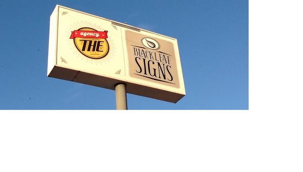 Sign in front of business