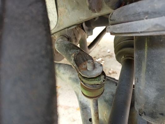 This is the passenger side roached and missing nut. You think they would have seen this replacing the upper control arm?