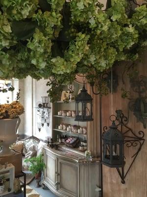 Hydrangea canopy and hanging iron lanterns!
