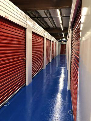 Wide, clean hallways with large rollup doors