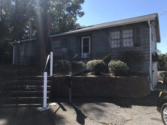 Grey house behind taco loco!