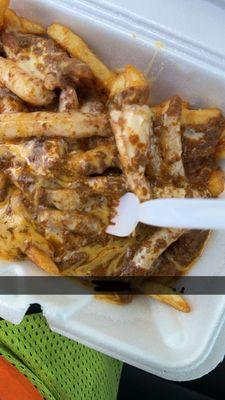 Chili cheese fries cheddar and Swiss cheese